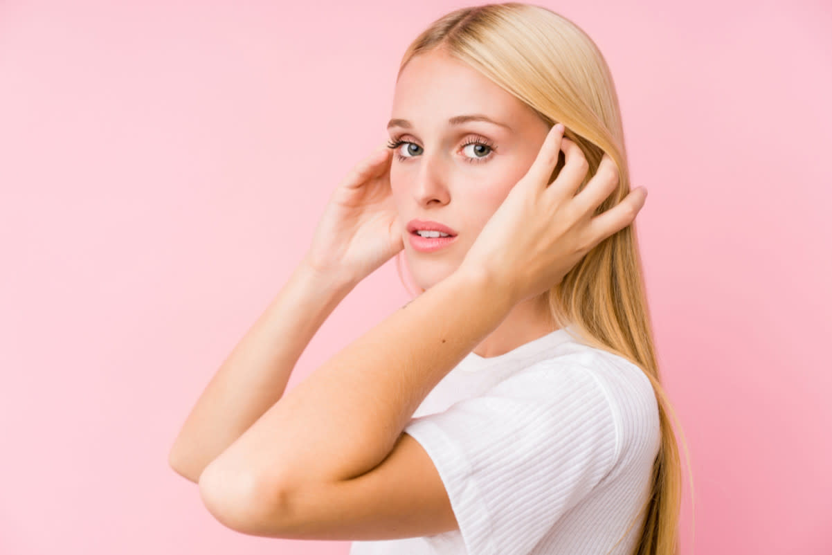 young blonde woman posing posing