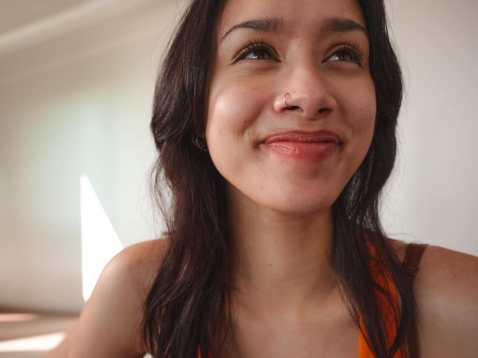 brunette-woman-with-nose-ring@2x