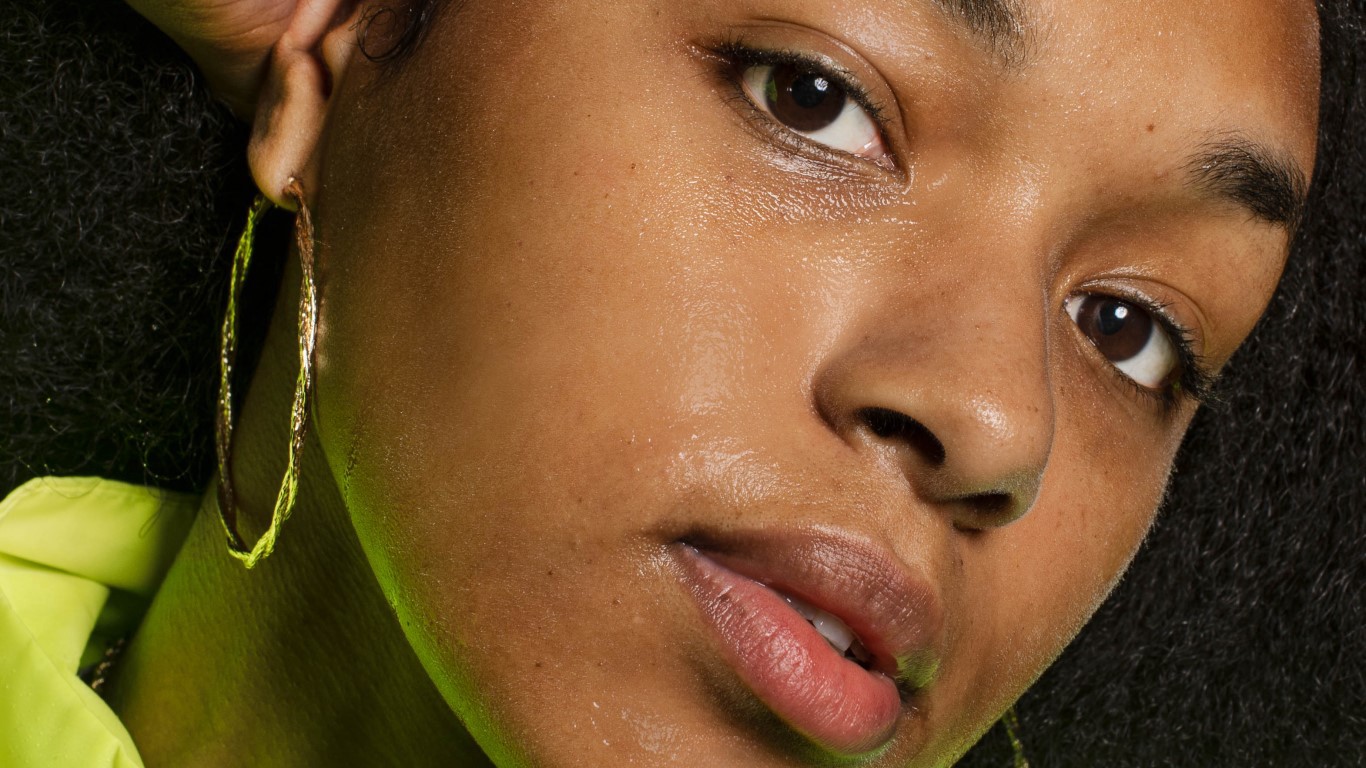 Closeup of woman with large earring 