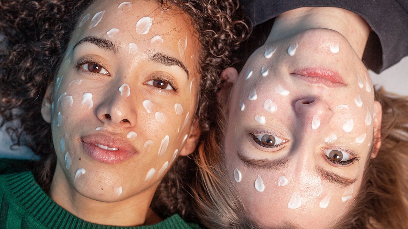 Women with skincare cream spots on their faces