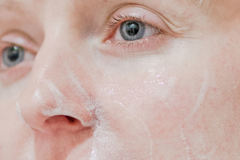 Closeup of a face with white lather on it