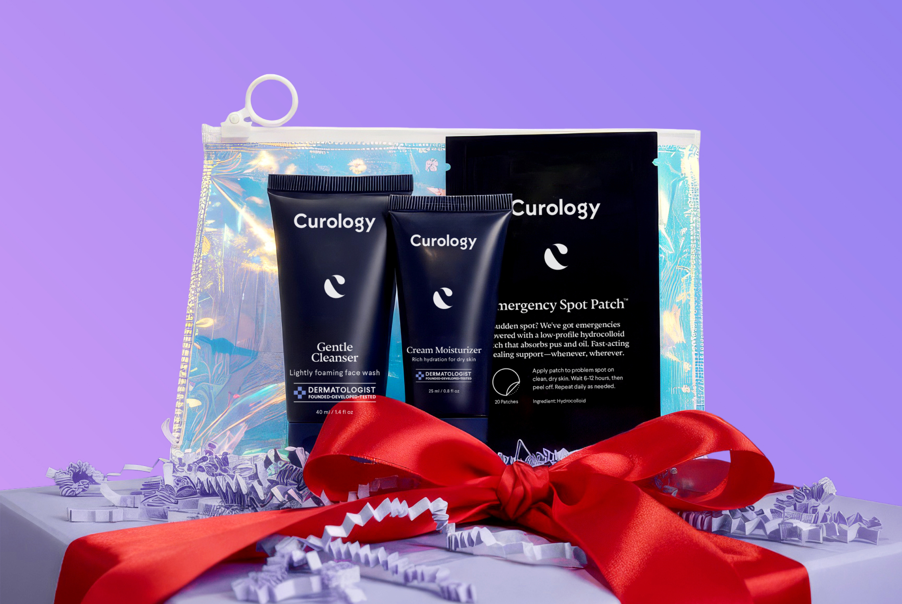 Blog GlowCurology dermatologist-approved skincare gift set featuring Gentle Cleanser, Cream Moisturizer, and Emergency Spot Patch, presented in gift-ready packaging with a red ribbon.ingSkin 01