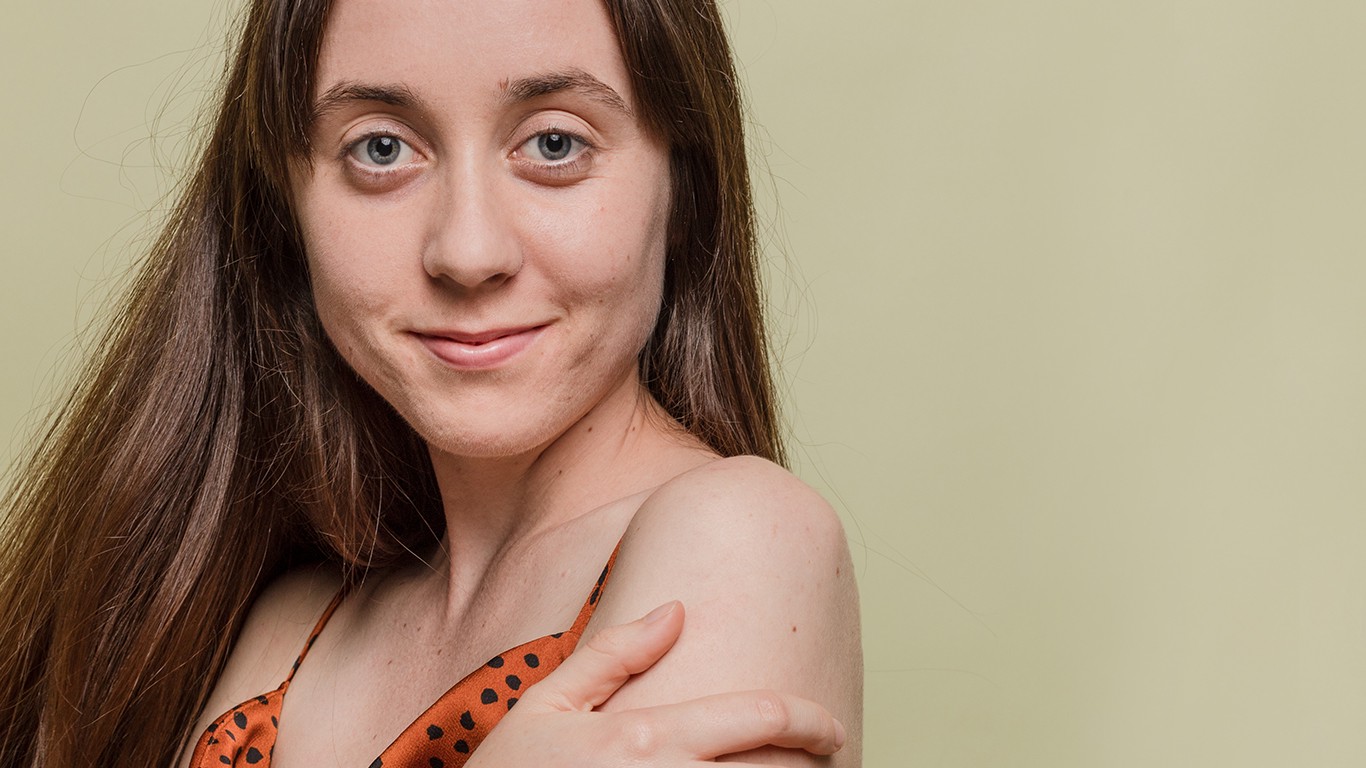Closeup of woman looking at camera smiling 