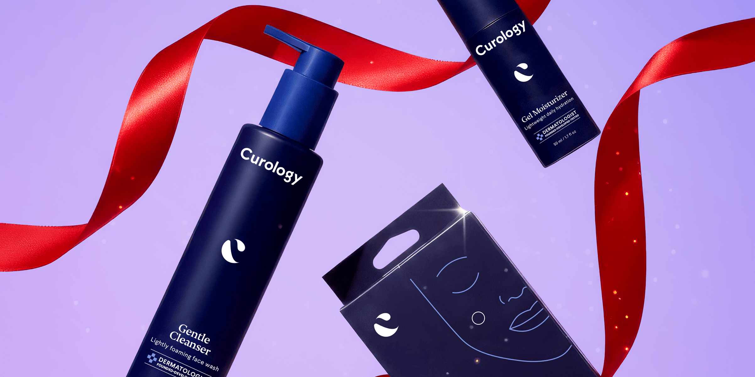 Curology skincare gift set with cleanser, moisturizer, and spot patches styled for the holidays.