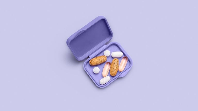Purple case of vitamins or pills