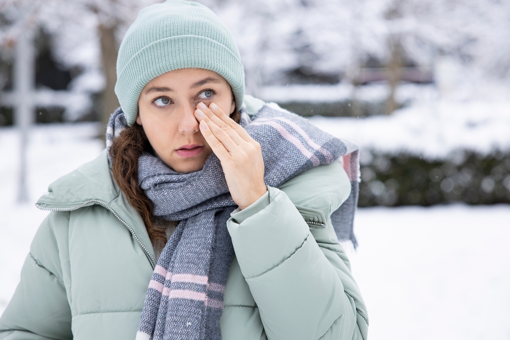 woman having itch on her face