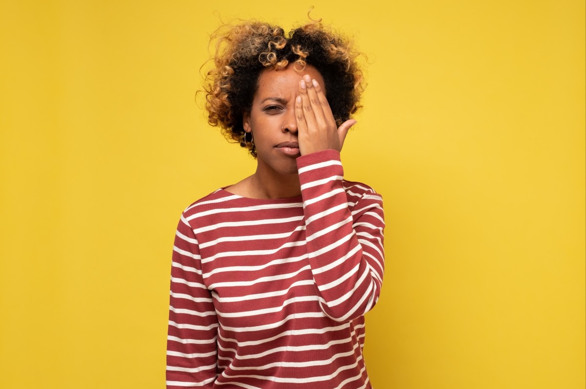 Woman Covering One Eye