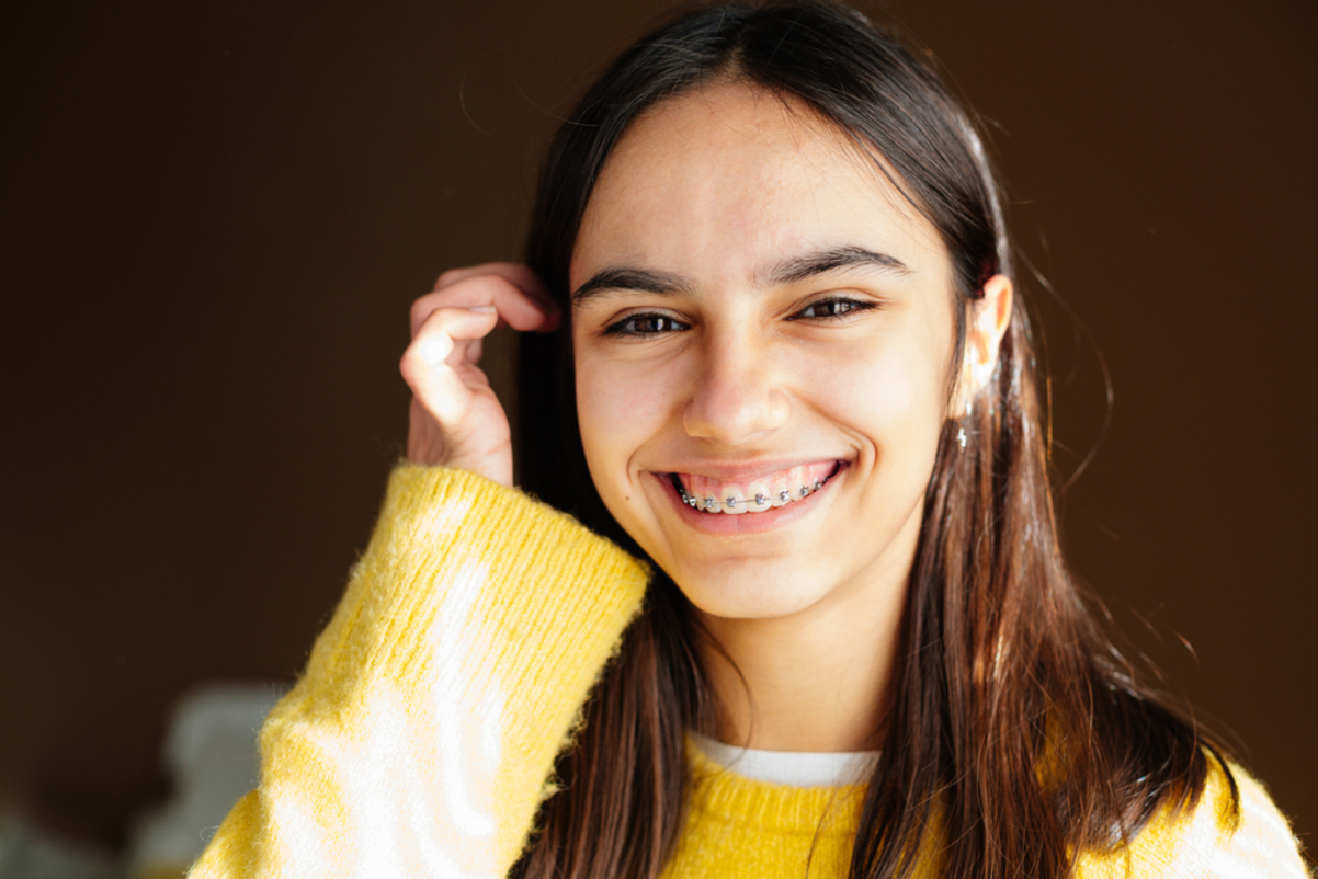 Happy teen girl with braces