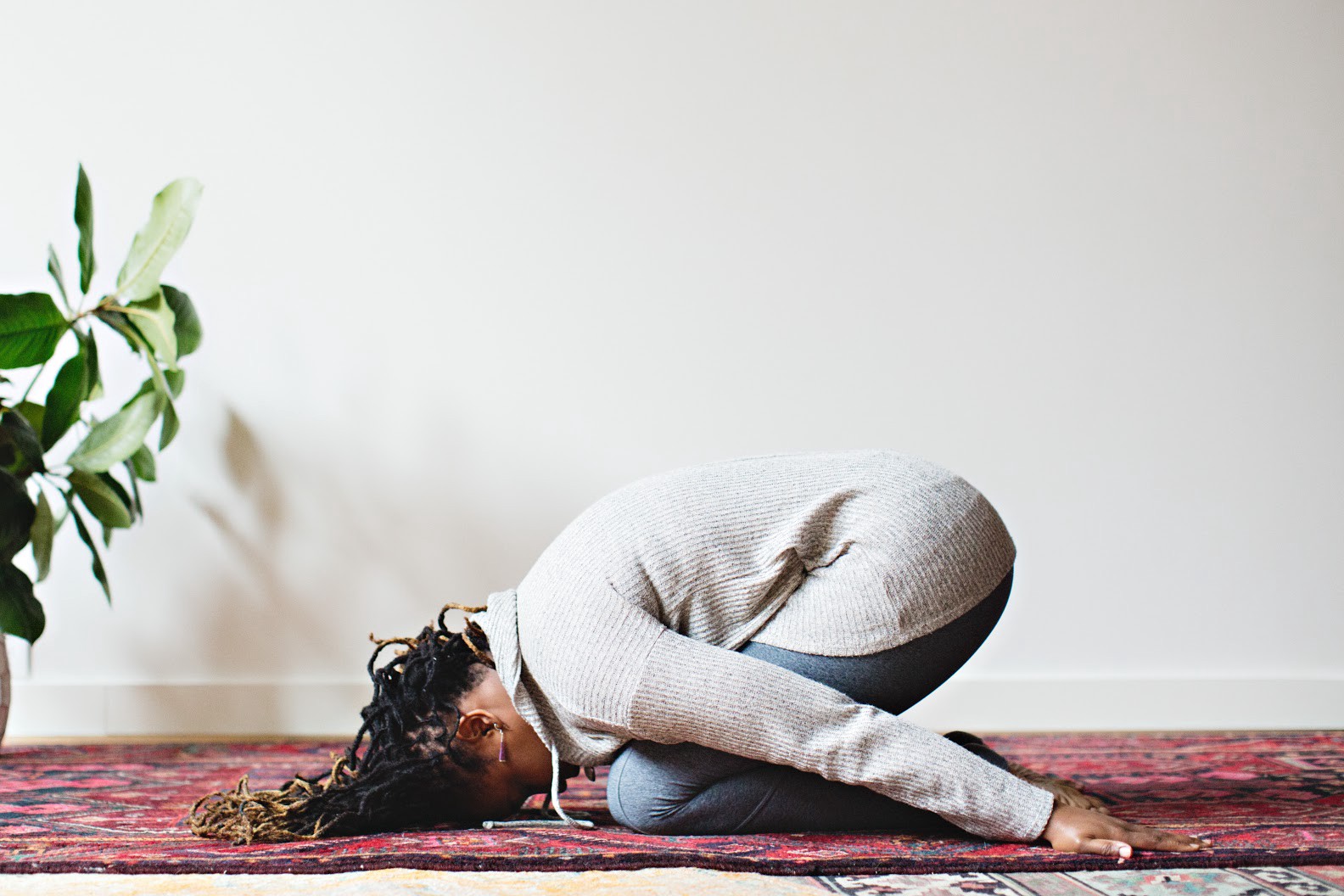 Woman doing a pose on the floor