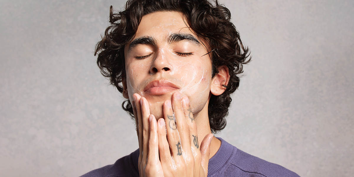 Man Cleansing Face with Curology Cleanser
