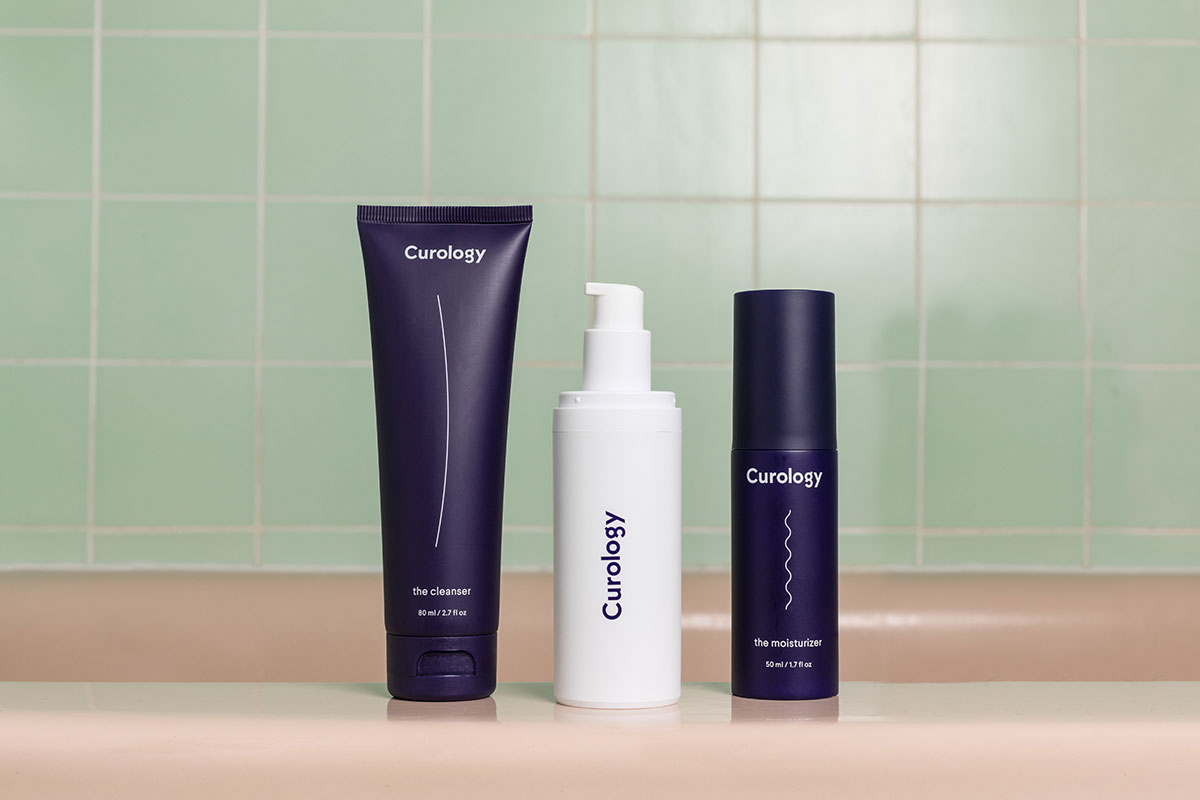 Curology cleanser, custom formula, and moisturizer against green tile