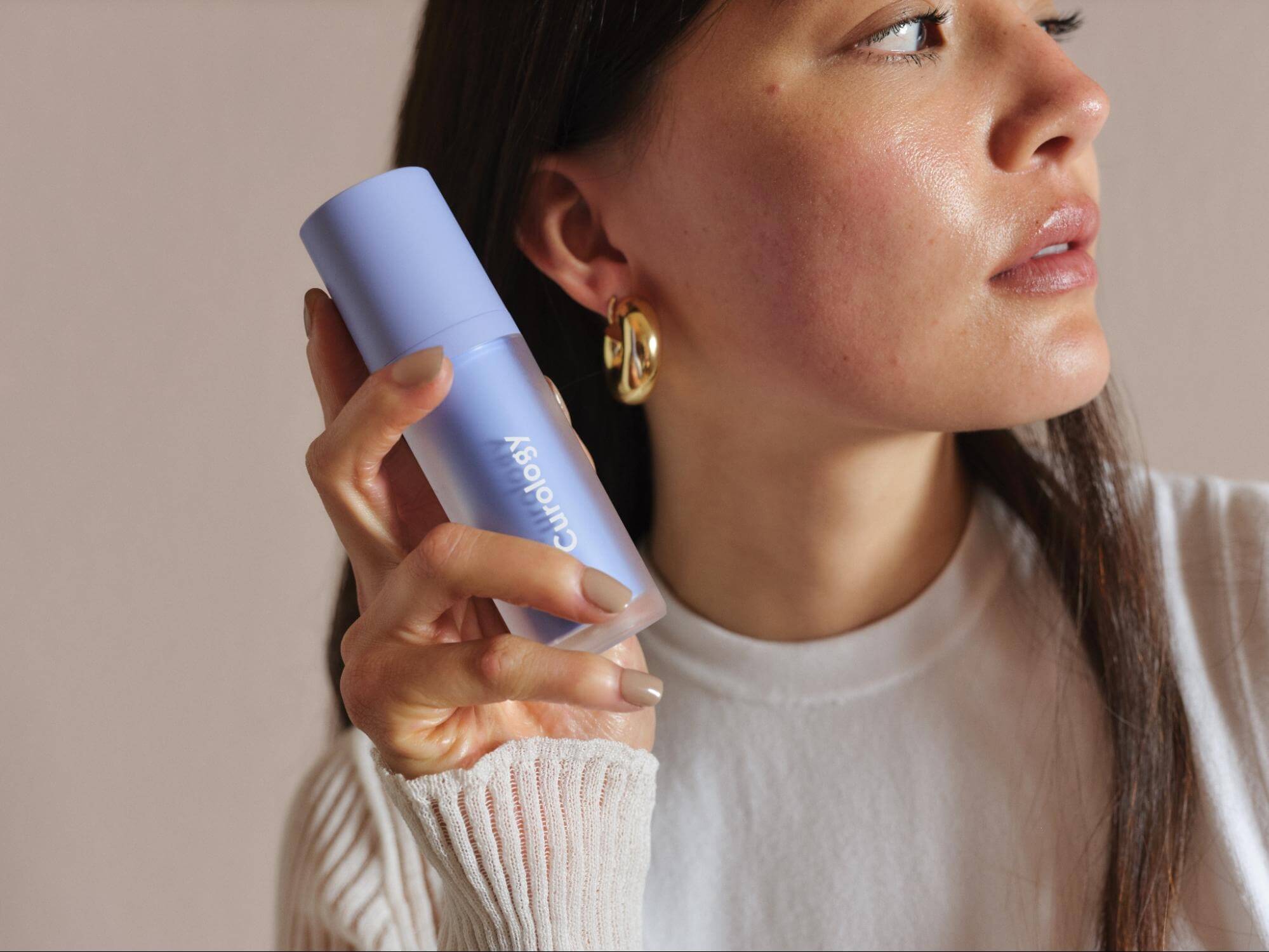 A Woman with a Curology Product