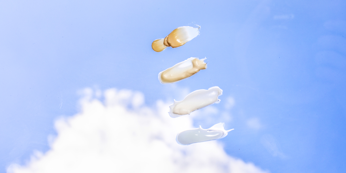 Skincare cream floating in the sky