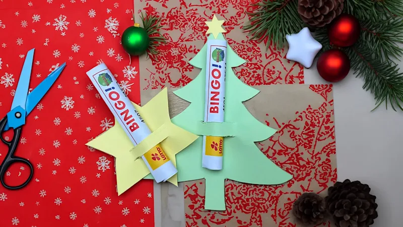 Selbst gebastelter Stern und Tannenbaum mit BIN<em>GO!</em>-Losen