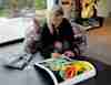 Ida Engberg signing prints of "Mile High Club"