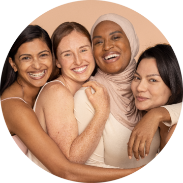 Four Women Hugging and Smiling