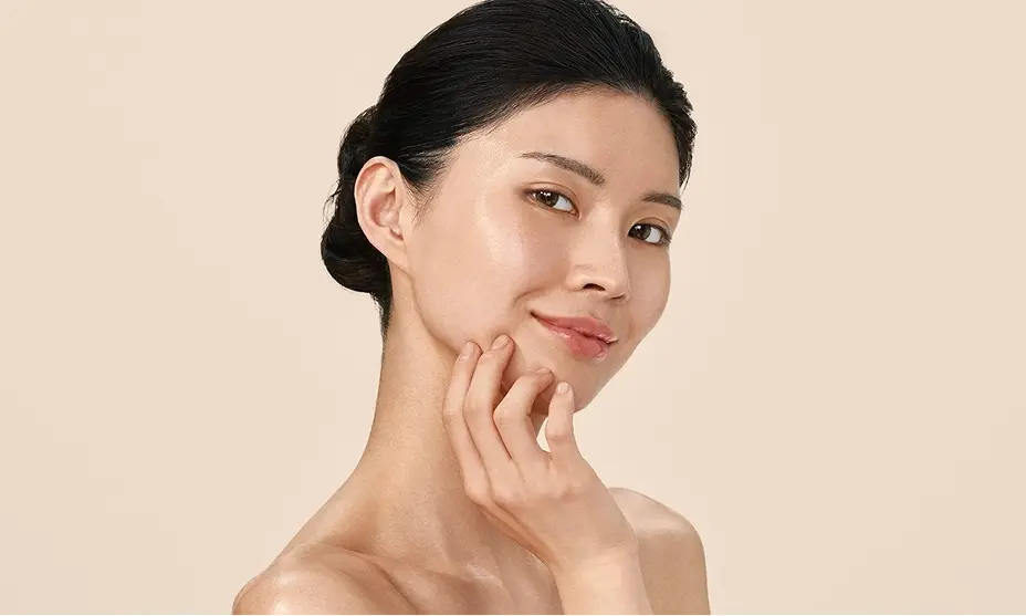 Happy woman with a positively radiant skin