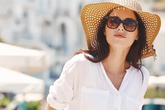 woman in sun with hat