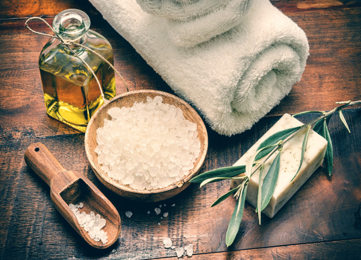 Spa setting with natural olive soap and sea salt 