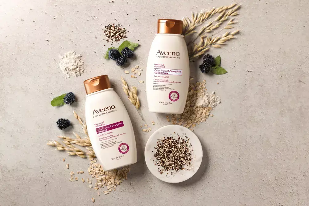 Aveeno® Color Protect & Strengthen Blackberry Quinoa Blend haircare set to color care and restore	