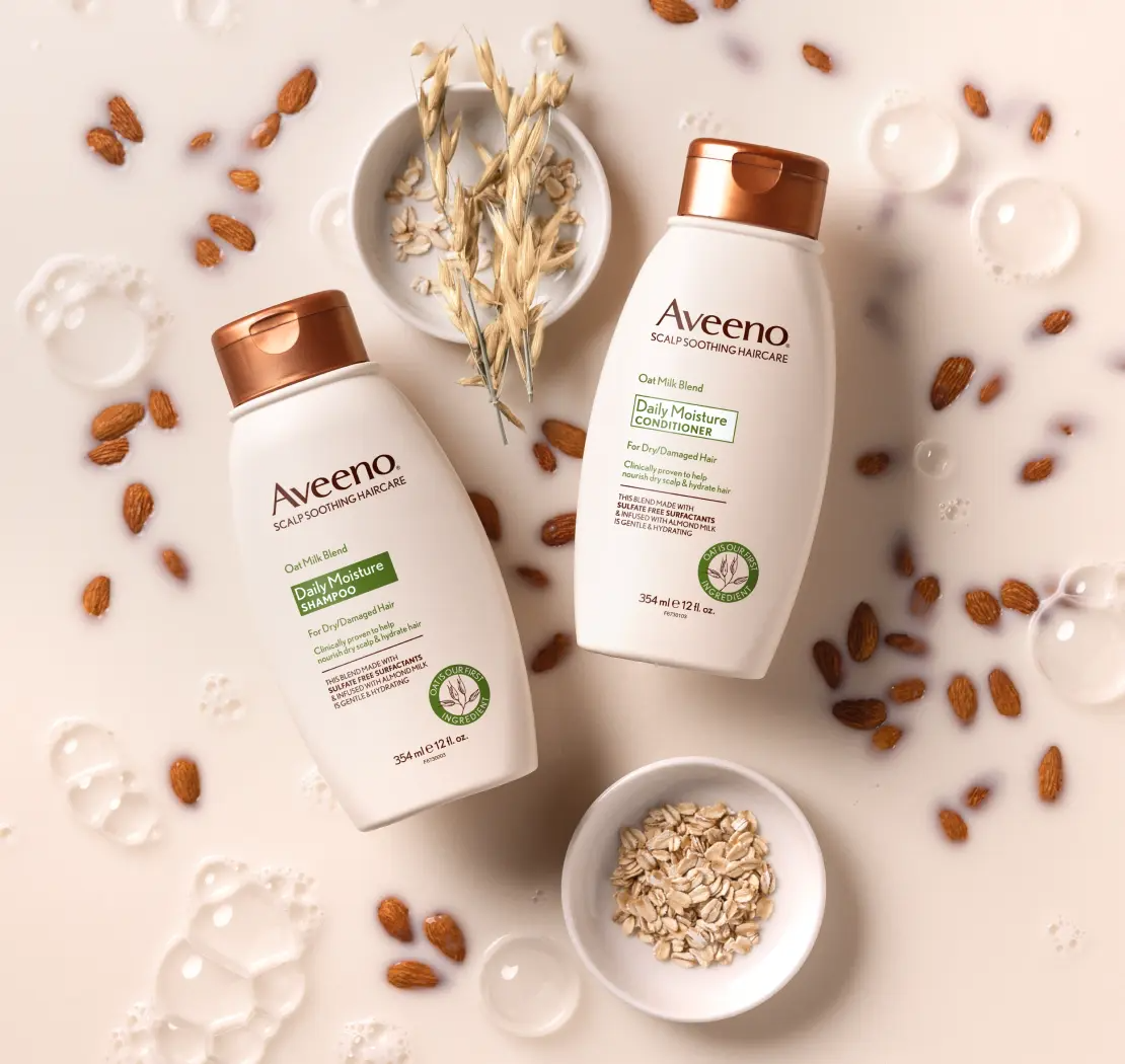 Aveeno® Daily Moisture haircare set displayed with its nourishing ingredients fit for all hair types