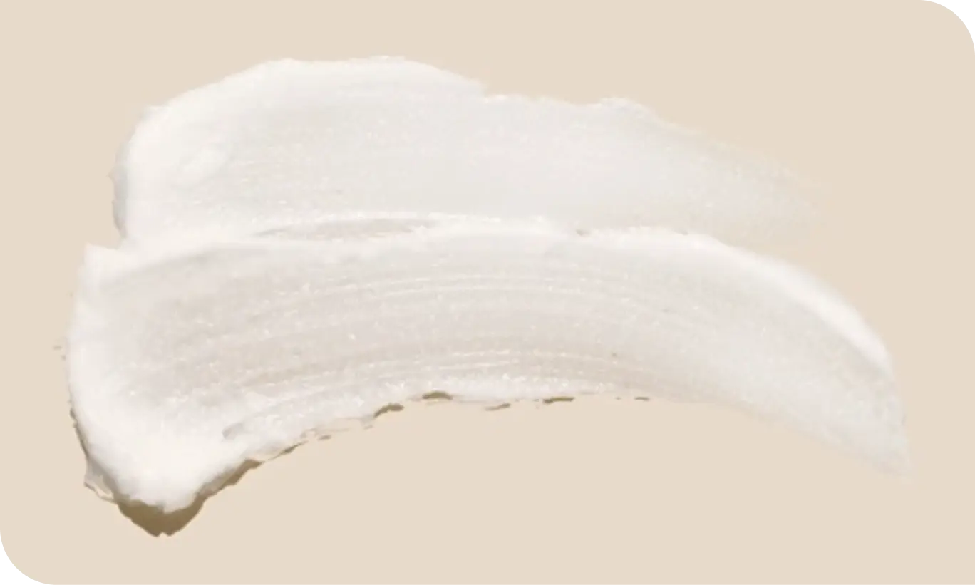 Image highlighting shea butter texture, clean and cream smooth texture.