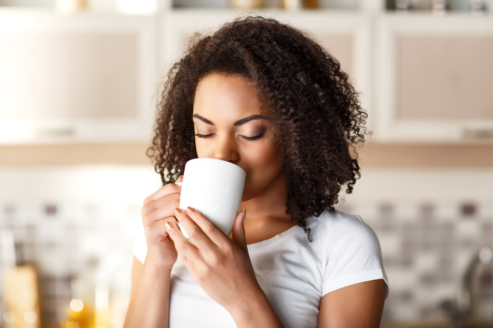 Beautiful woman drinking tea.