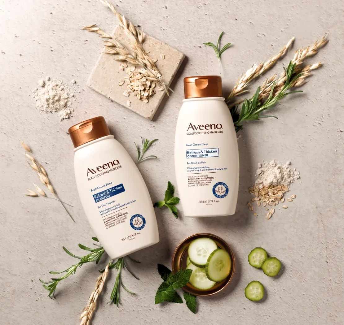 Aveeno® Refresh & Thicken haircare set displayed with its nourishing ingredients that add thickness to hair