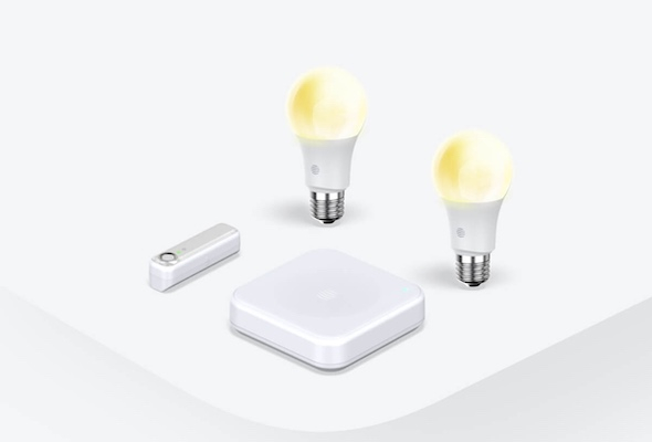 Composite image of Hive smart devices, including Hive smart light bulbs, Hive Motion Sensor and Hive Hub, on a white background