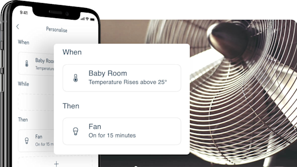 Side angle of smartphone showing Hive app with a pop-out screen in the middle of the image showing Hive actions set-up, with a metal fan in the background image
