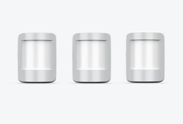 Composite image of three Hive Pet Friendly Motion Sensors on a light grey background