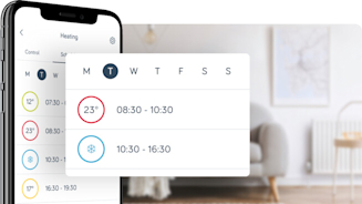 Side angle of smartphone showing Hive app with a pop-out screen in the middle of the image showing Hive schedule set-up, with a grey sofa and framed map in the background