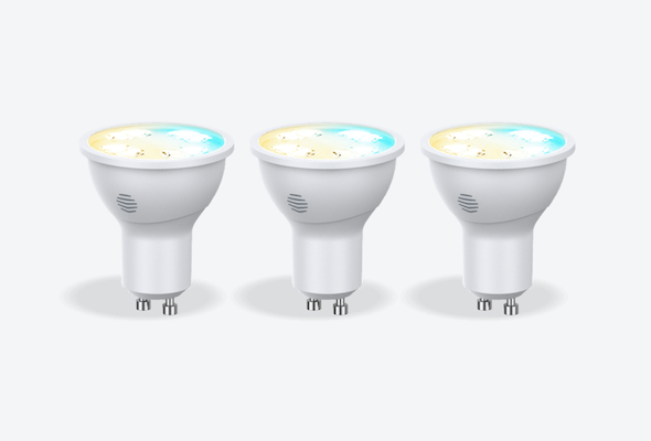 Front facing view of three Hive GU10 Smart Light Bulbs, in cool to warm colours, on a light grey background