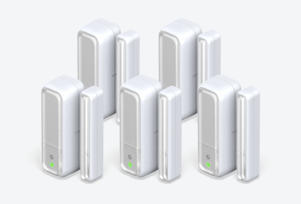 Side angle view of five Hive Window or Door Sensors, with green lights showing on each device, on a white background