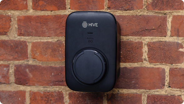 Black EO Mini Pro 3 from Hive EV Charging attached to a red brick wall
