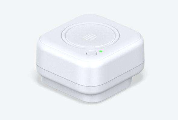 Side view of Hive Signal Booster, with top facing upwards and green light showing on device, on a white background