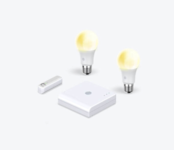 Composite image of Hive smart devices, including Hive smart light bulbs, Hive Motion Sensor and Hive Hub, on a white background