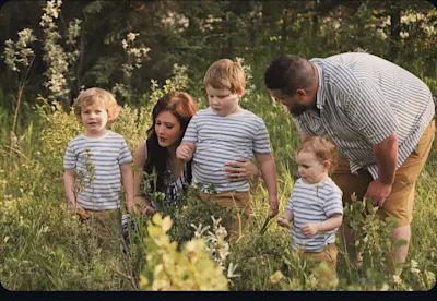 Calgary move coordinator Kate Hall with her husband and three children.