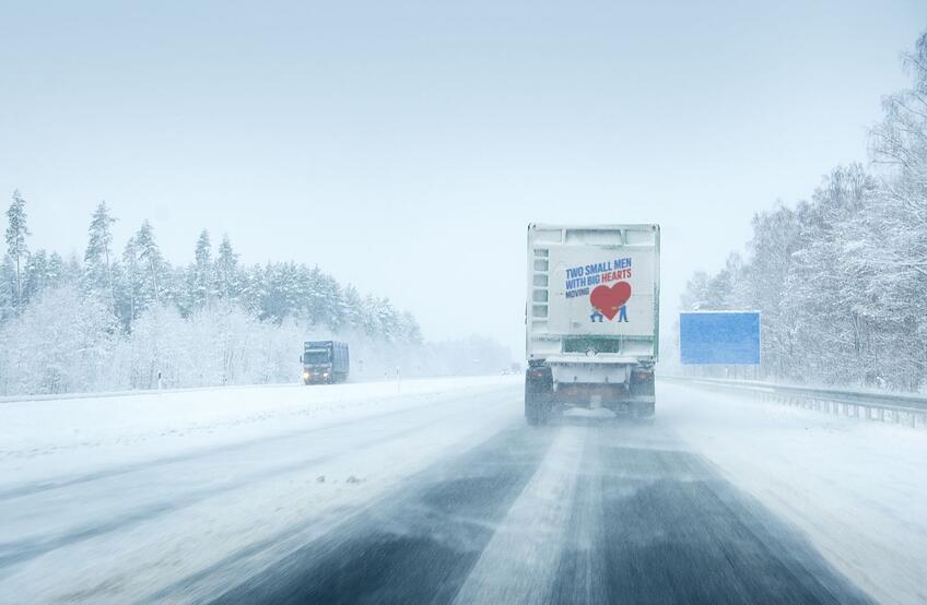 two-small-men-truck-snow