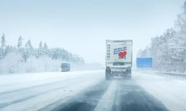 two-small-men-truck-snow