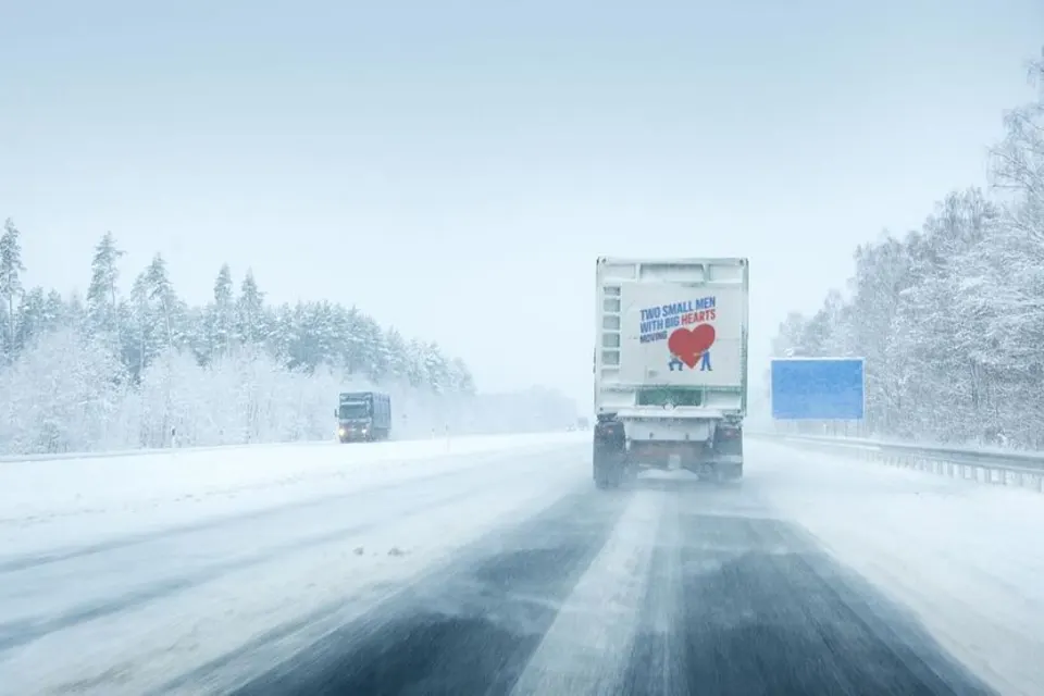 two-small-men-truck-snow