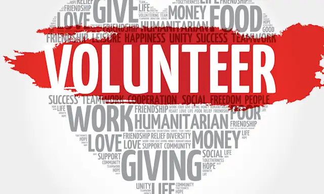 Word cloud in the shape of a heart with 'VOLUNTEER' prominently in the centre.