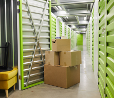 a bunch of boxes in a storage unit