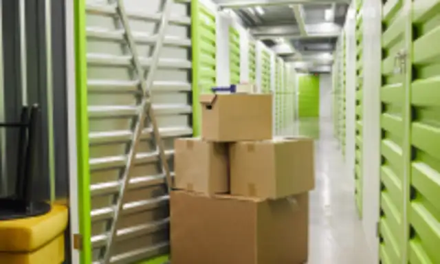 a bunch of boxes in a storage unit