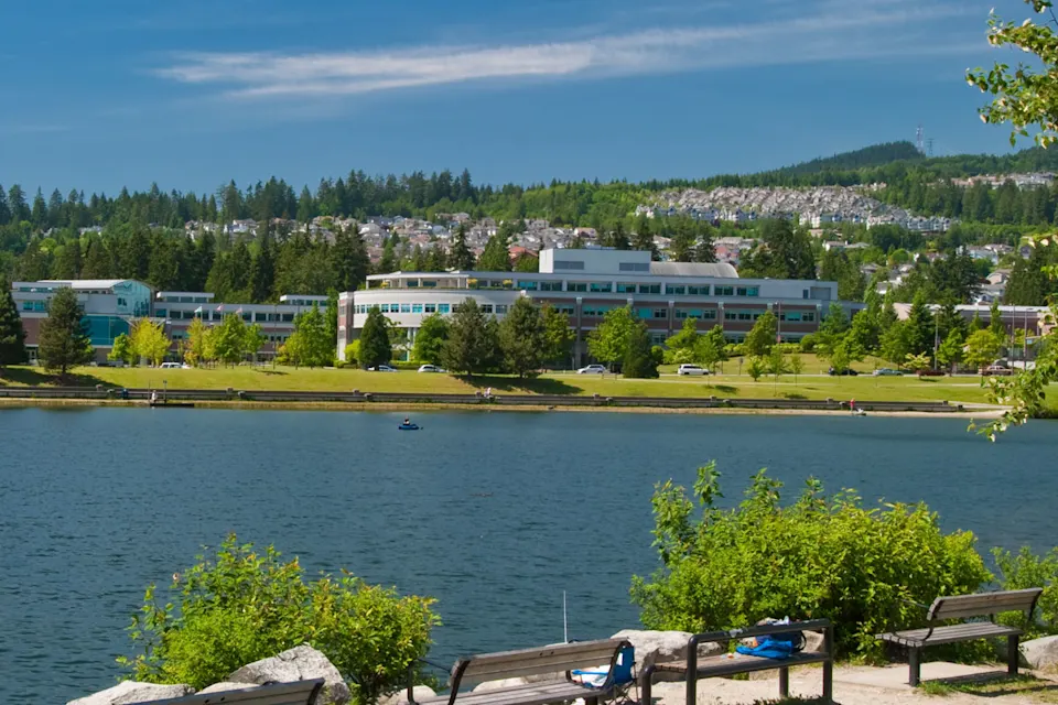 Park with benches overlooking a lake in Coquitlam, BC.