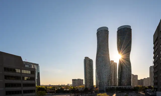 Sunset view of the Absolute World Towers, also known as the Marilyn Monroe Towers, in Mississauga, Ontario.