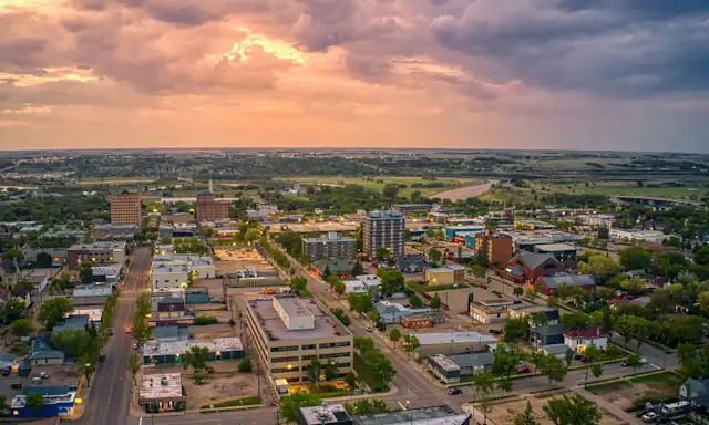 Aerial view of Brandon, Manitoba, at sunset.
