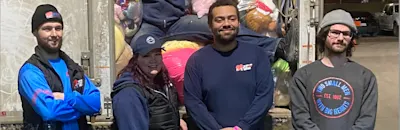 Kristin Sherlock along with a crew of Two Small Men movers collects all the plush toys donated at a Calgary hockey game for distribution. For Two Small Men with Big Hearts, it's only the tip of the iceberg when it comes to giving back to the community.