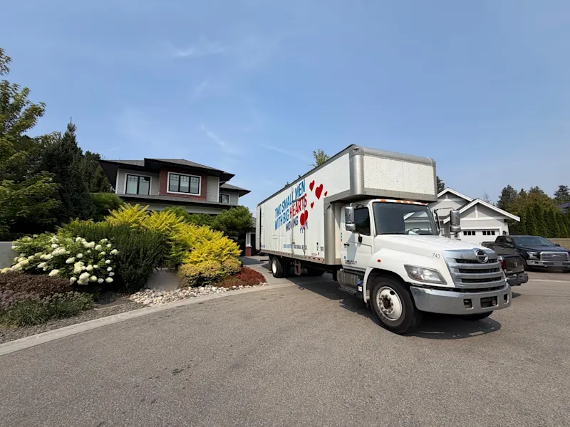 Two Small Men moving truck on a residential move
