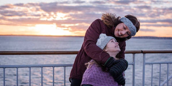 Family - Mother and daughter on deck - winter